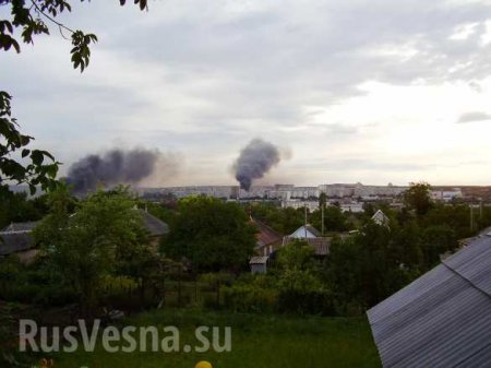 Луганск в огне: пылают дома и машины, над городом клубы дыма, на улицах погибшие (фото/видео 18+)
