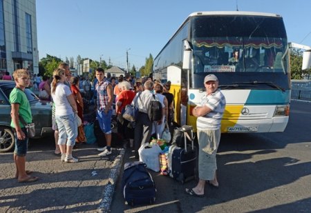 29.07.14 года был обстрелян карателями ВСУ автобус с беженцами в пгт Рассыпное (ДНР)