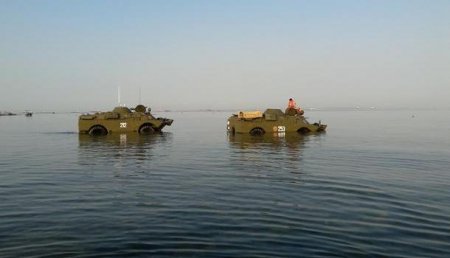 Активисты переправились на двух бронемашинах через Керченский пролив