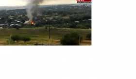 Украинские фашисты обстреляли Краснодон из артиллерии: горят дома (видео)