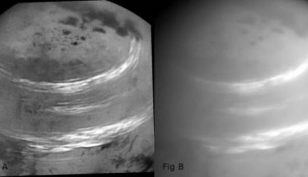 Зонд «Кассини» передал фото странных туманных кругов на спутнике Сатурна