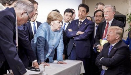 Трамп прокомментировал «плохое фото» с нависающей над ним Меркель